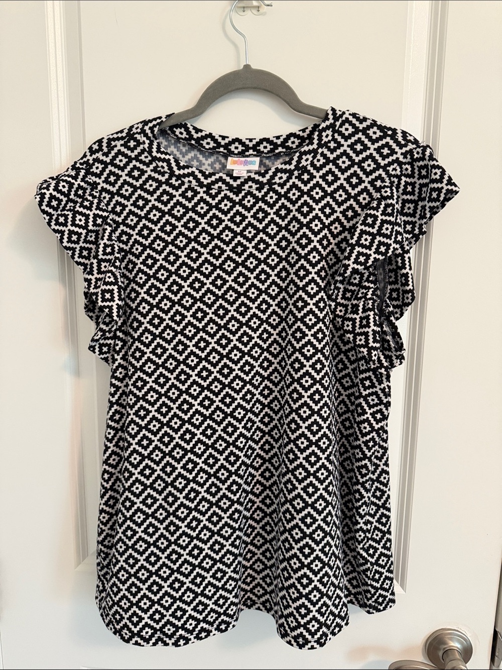 LuLaRoe Black and White Geometric Ruffle Sleeve Top